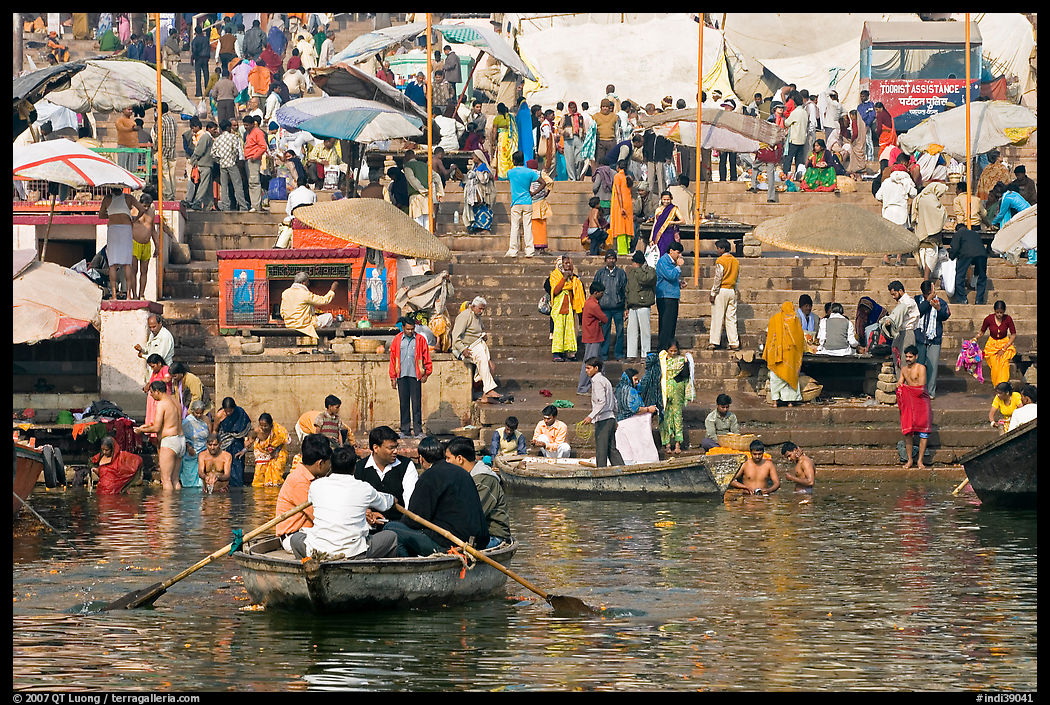 Boats and stone steps leading to Ganga River, Dasaswamedh Ghat. Varanasi, Uttar Pradesh, India