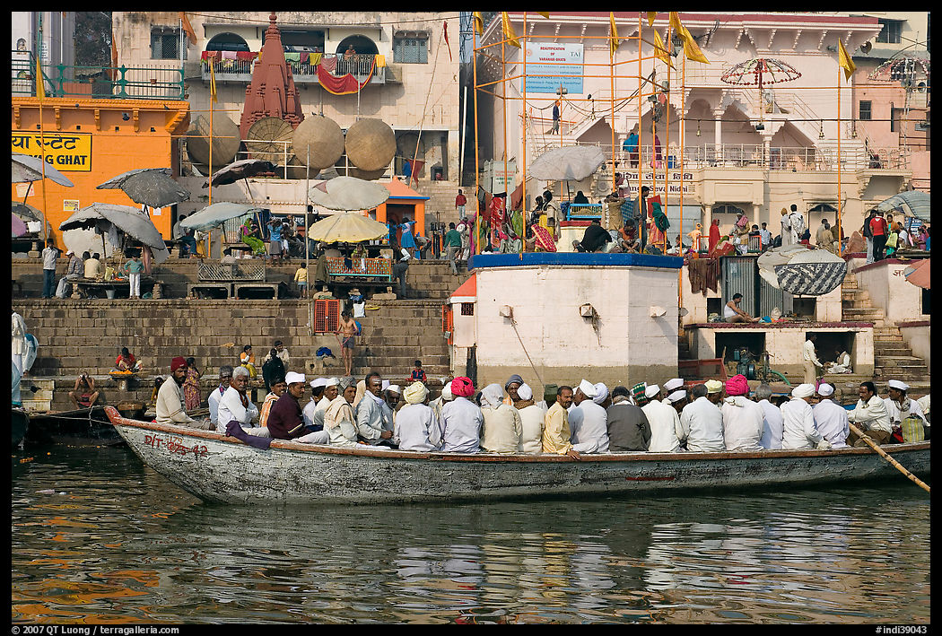 Boat packed with men near Dasaswamedh Ghat. Varanasi, Uttar Pradesh, India