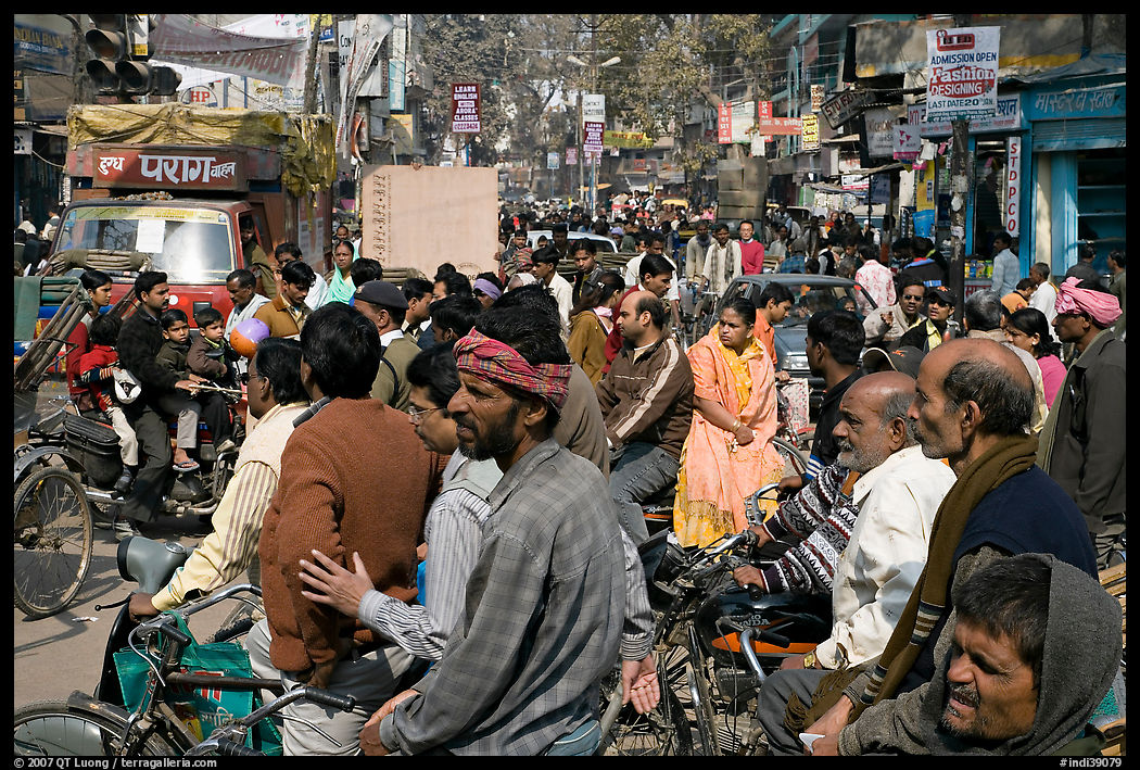 Riders waiting in congested street. Varanasi, Uttar Pradesh, India