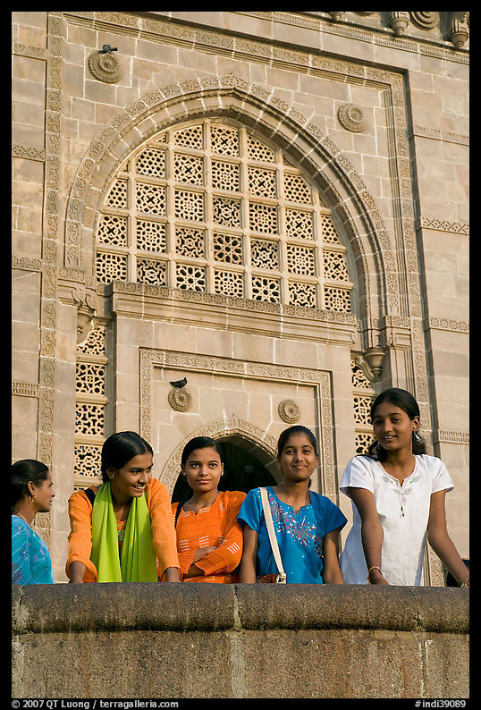 Girls in front of Gateway of India. Mumbai, Maharashtra, India