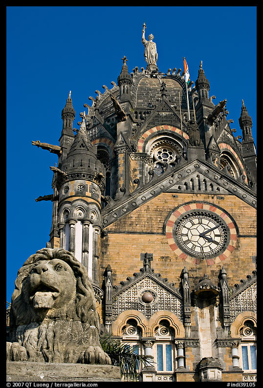 Lion and Gothic tower topped by 4m-high statue of Progress, Victoria Terminus. Mumbai, Maharashtra, India