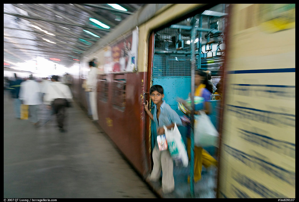 View of departing train with motion blur. Mumbai, Maharashtra, India