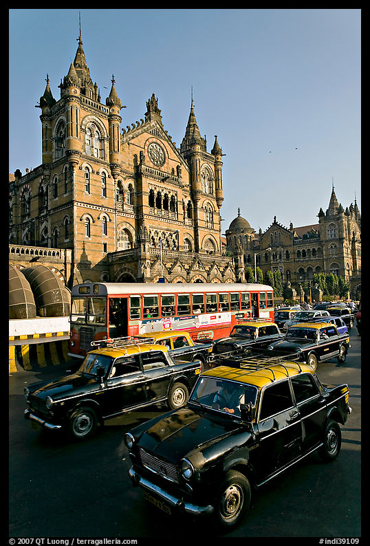 Black and Yellow cabs in front of Victoria Terminus. Mumbai, Maharashtra, India