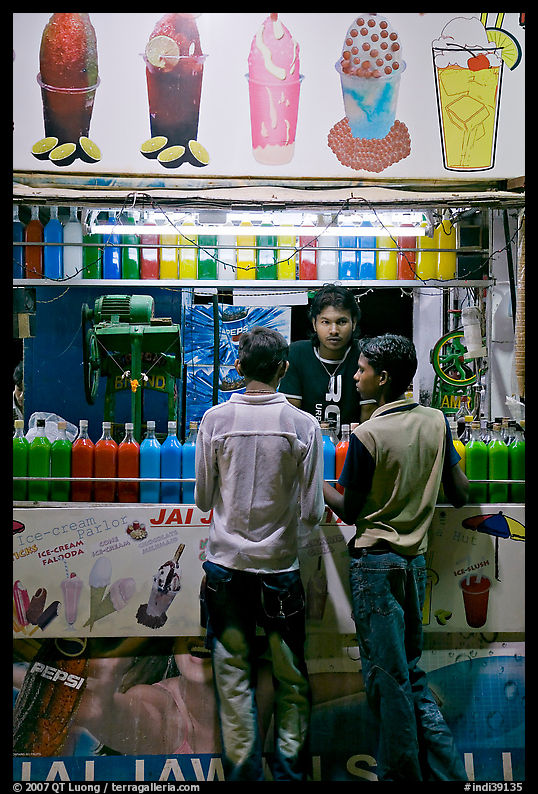 Stall with colorful drinks, Chowpatty Beach. Mumbai, Maharashtra, India