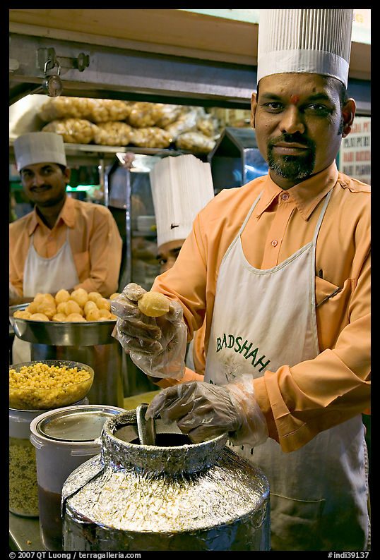 Cooks in food stall, Chowpatty Beach. Mumbai, Maharashtra, India