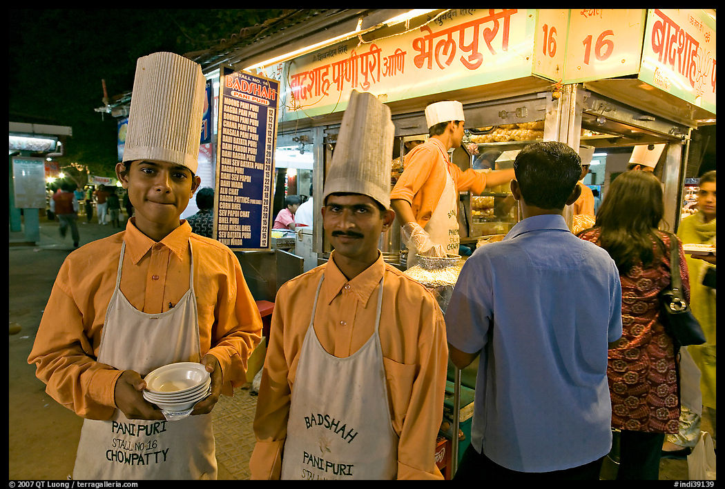Cooks in front of Panipuri stall, Chowpatty Beach. Mumbai, Maharashtra, India