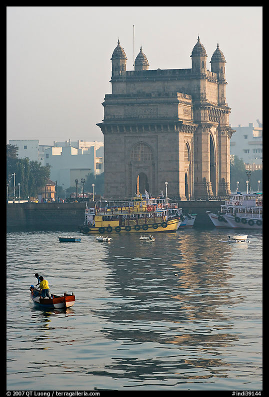 Small boat and Gateway of India, early morning. Mumbai, Maharashtra, India