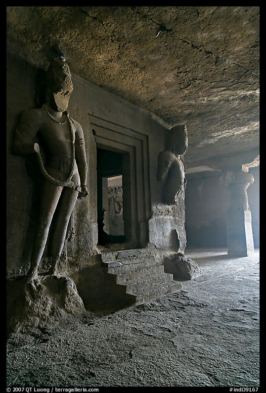 Figures of Dwarpala on Shiva shrine, Elephanta caves. Mumbai, Maharashtra, India