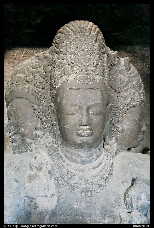 Triple-headed Shiva sculpture, Elephanta caves. Mumbai, Maharashtra, India