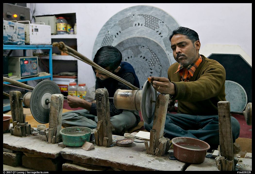 Men polishing marble. Agra, Uttar Pradesh, India