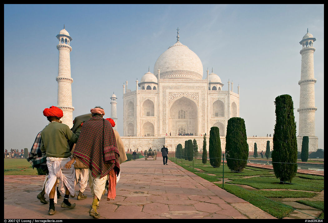 Men walking toward Taj Mahal, early morning. Agra, Uttar Pradesh, India