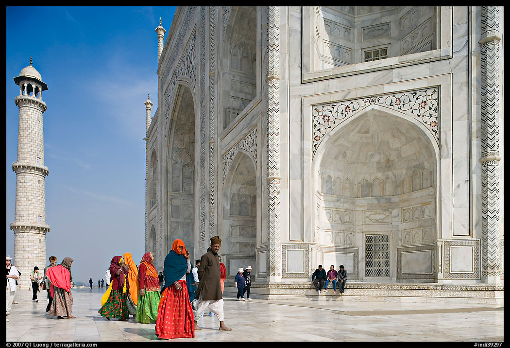 Base of Taj Mahal, minaret, and visitors. Agra, Uttar Pradesh, India
