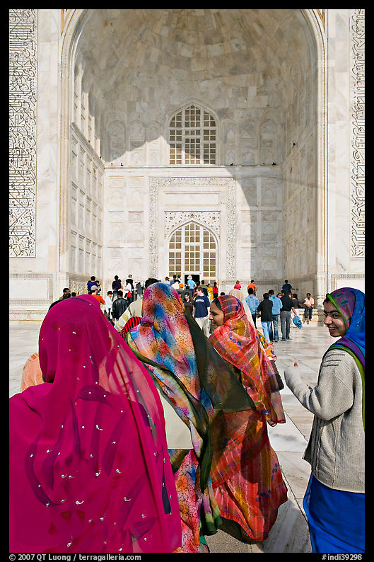 Women in front of main Iwan, Taj Mahal,. Agra, Uttar Pradesh, India