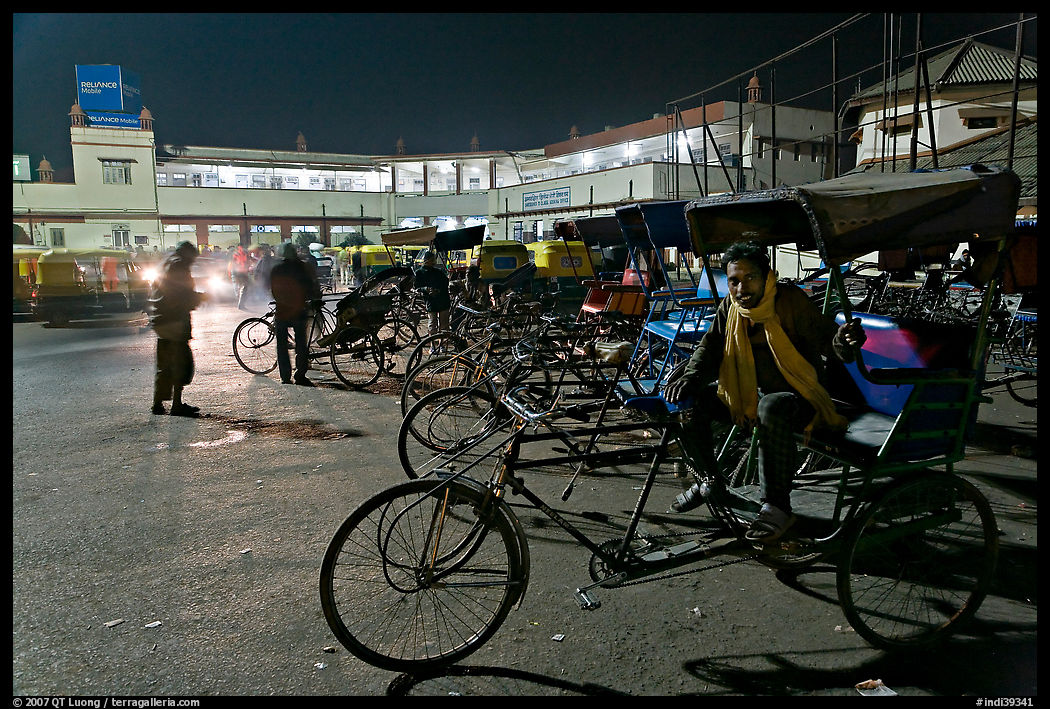 Cycle-rickshaws in front of train station. Agra, Uttar Pradesh, India