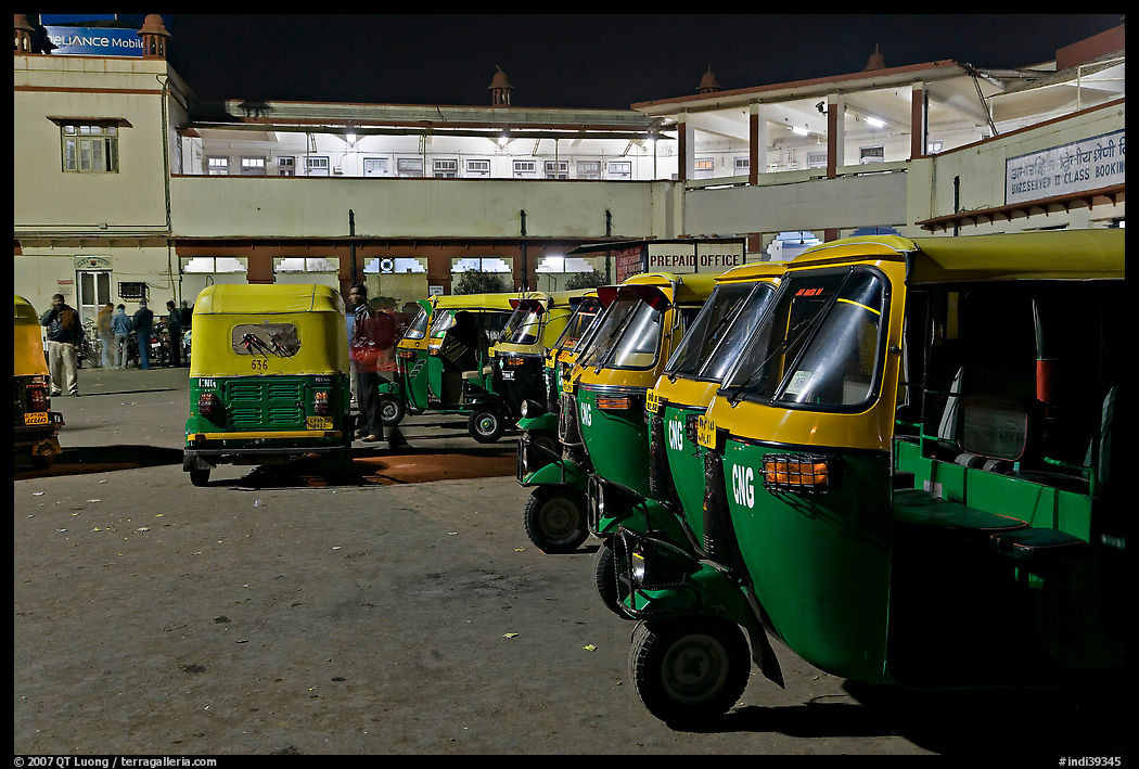 Auto-rickshaws in front of train station. Agra, Uttar Pradesh, India