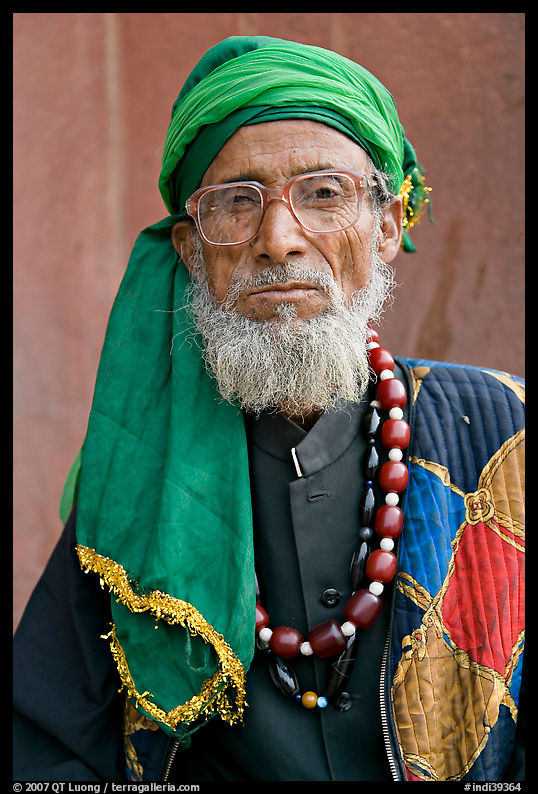 Elderly bespectacled man. Fatehpur Sikri, Uttar Pradesh, India