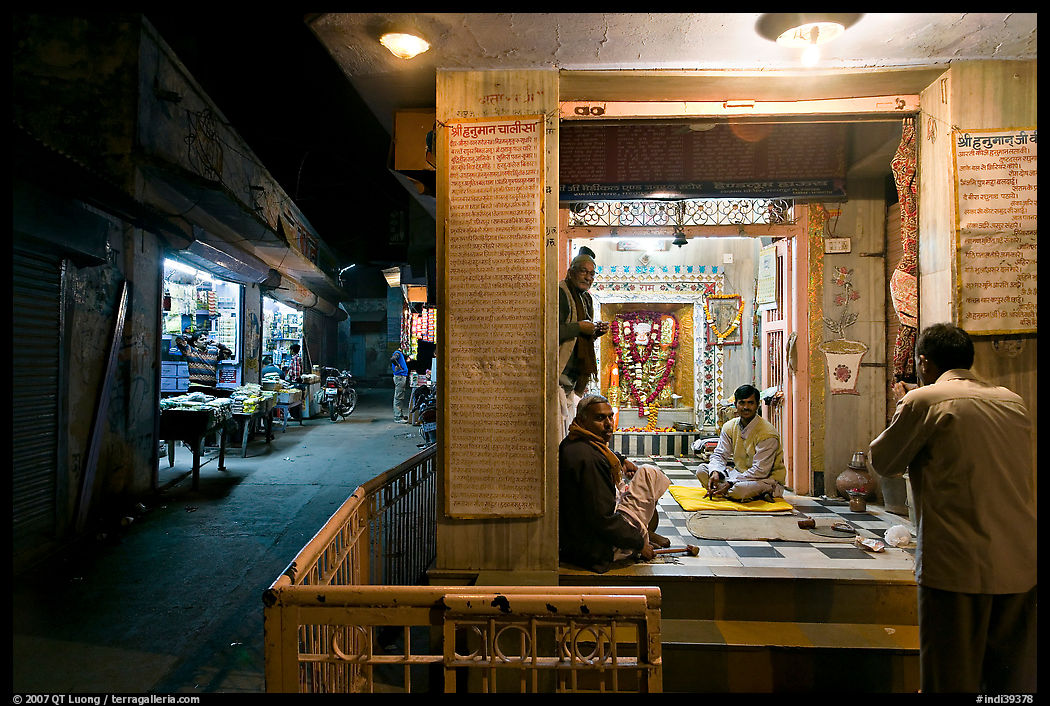 Hindu temple at street corner by night. Bharatpur, Rajasthan, India
