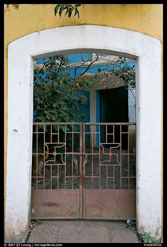 Gate, yard, and house, Panjim. Goa, India