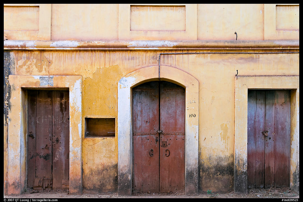 Facade painted yellow, Panjim. Goa, India
