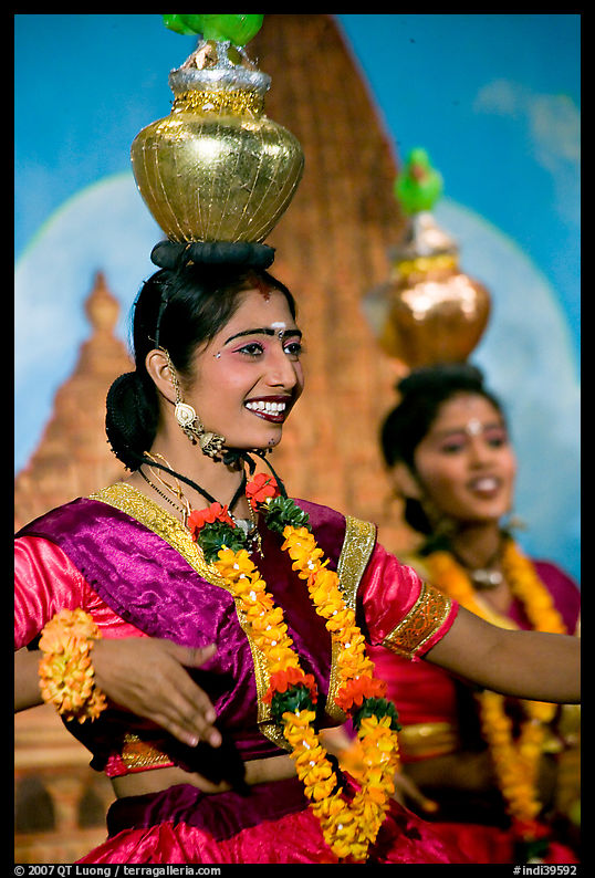 Women dancing with jars on head, Kandariya show. Khajuraho, Madhya Pradesh, India