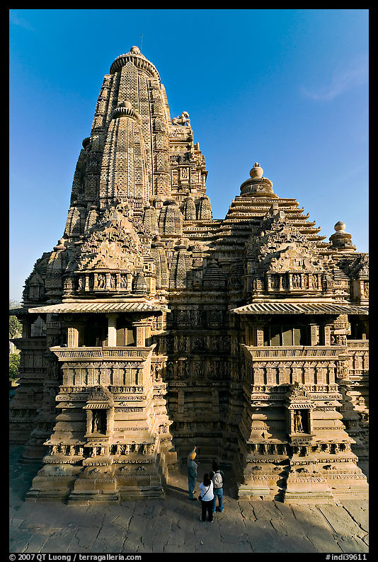 Lakshmana temple seen from Matangesvara temple, with people looking. Khajuraho, Madhya Pradesh, India