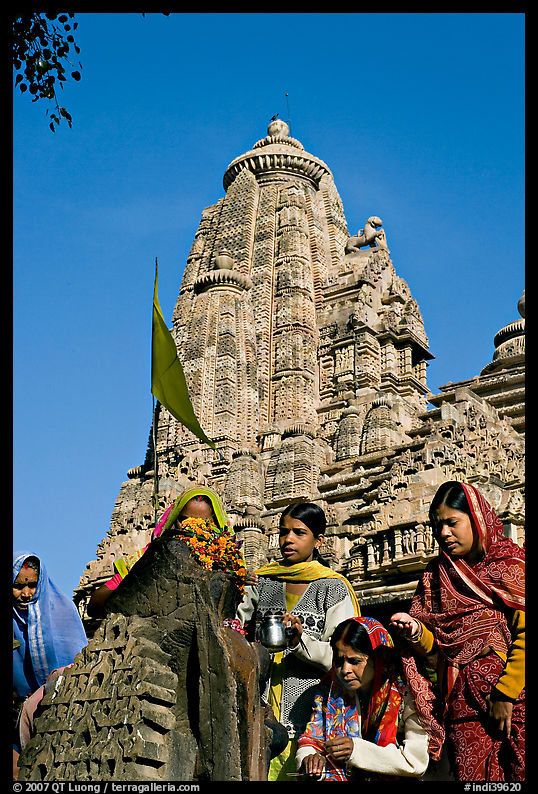 Morning Puja in front of Lakshmana temple. Khajuraho, Madhya Pradesh, India