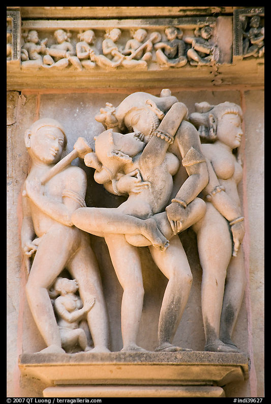 Erotic sculpture of couple in embrace, Lakshmana temple. Khajuraho, Madhya Pradesh, India