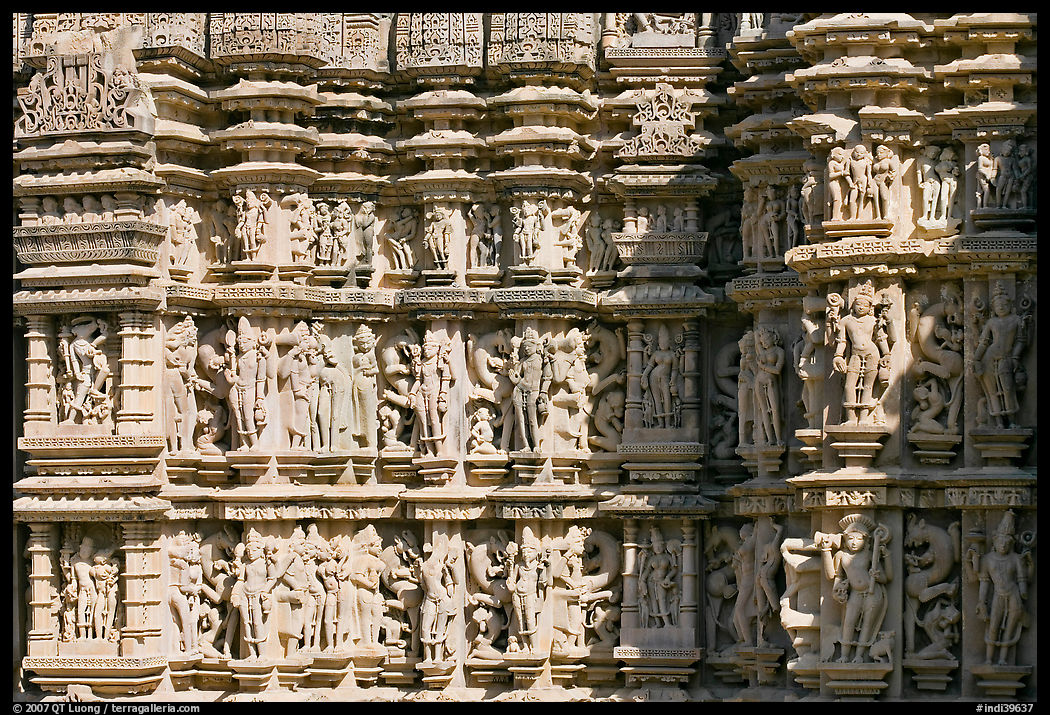 Sculptures on the outside of Kadariya-Mahadeva temple. Khajuraho, Madhya Pradesh, India
