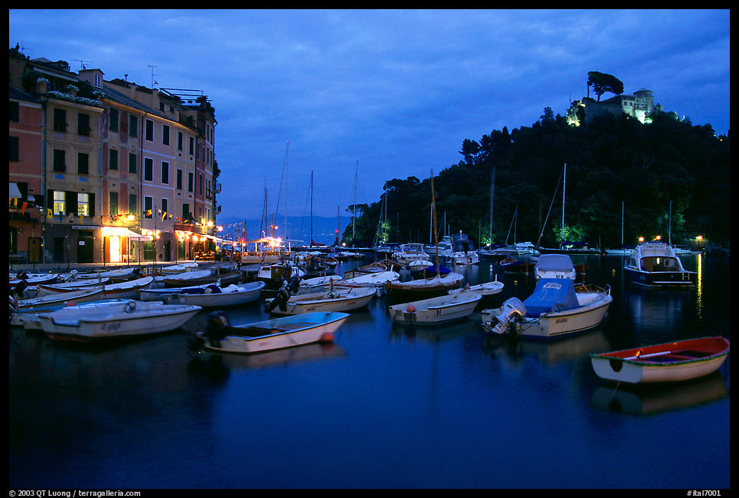 Harbor and San Giorgio castle at dusk, Portofino. Liguria, Italy