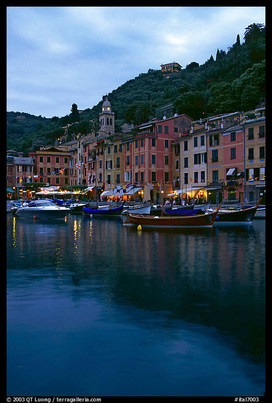 Yachts and fishing boats in Harbor at dusk, Portofino. Liguria, Italy