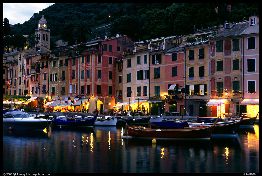Paster-colored houses around the harbor at dusk, Portofino. Liguria, Italy