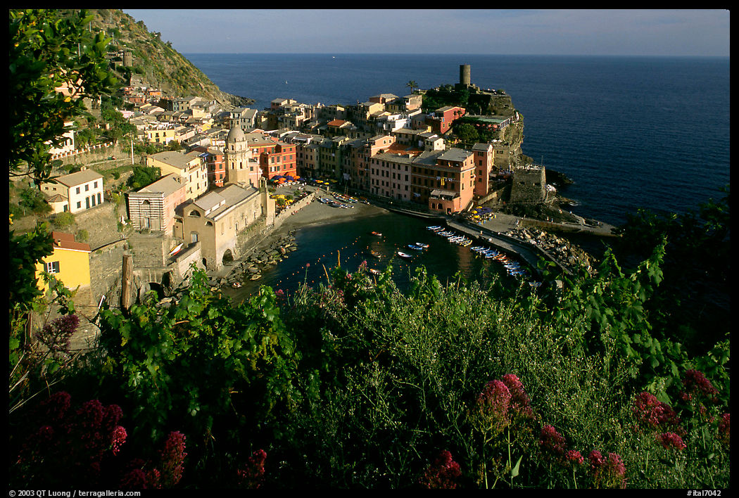 Harbor, church, 11th century castle and village, late afternoon, Vernazza. Cinque Terre, Liguria, Italy