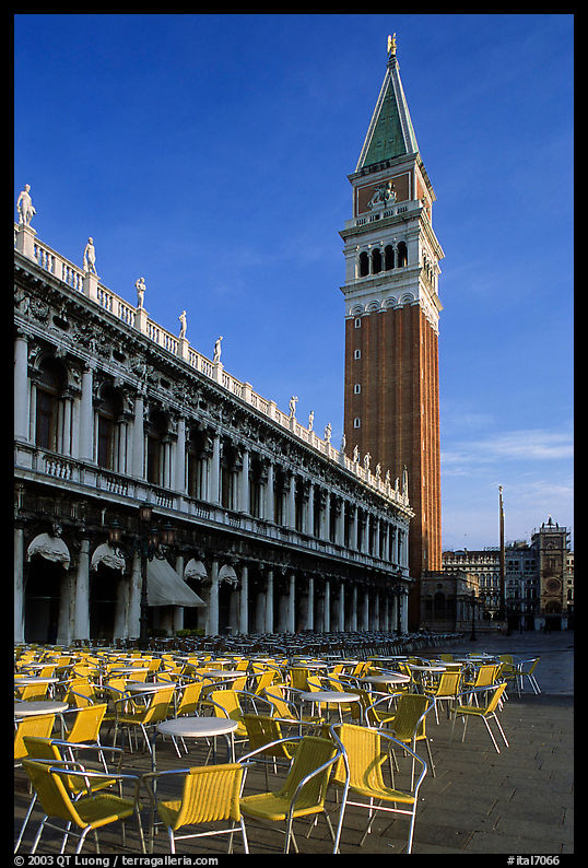 Campanile, Zecca, and empty chairs, Piazza San Marco (Square Saint Mark), early morning. Venice, Veneto, Italy