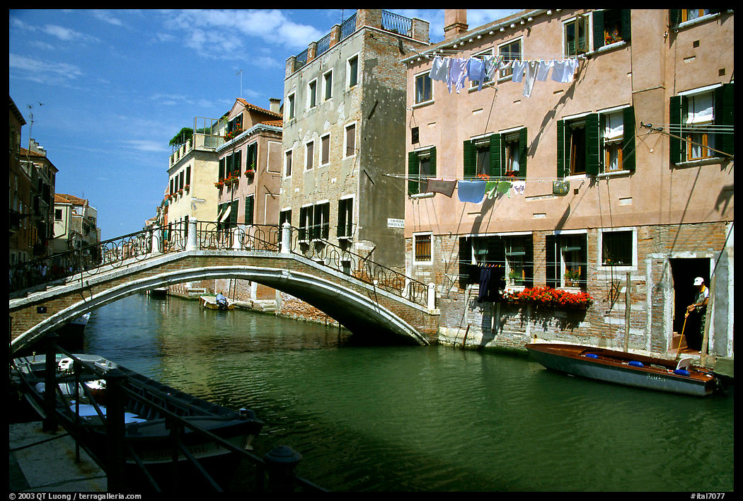 Bridge spanning a canal, Castello. Venice, Italy