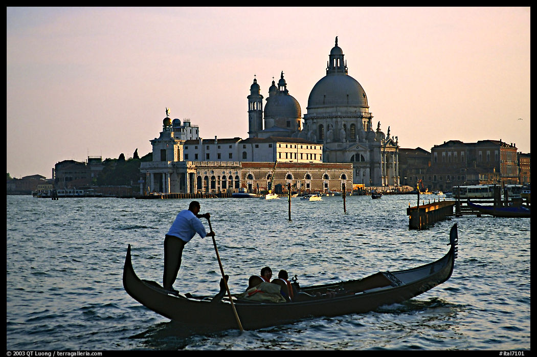 Gondola,  Santa Maria della Salute church, late afternoon. Venice, Italy