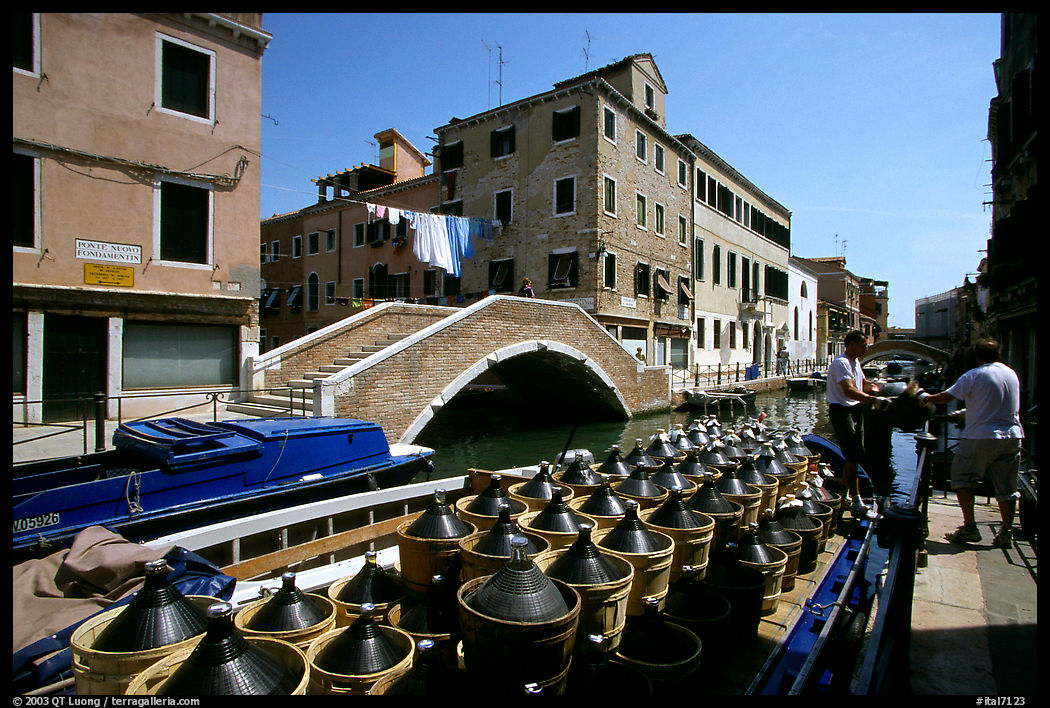 Delivery of wine along a side canal, Castello. Venice, Veneto, Italy