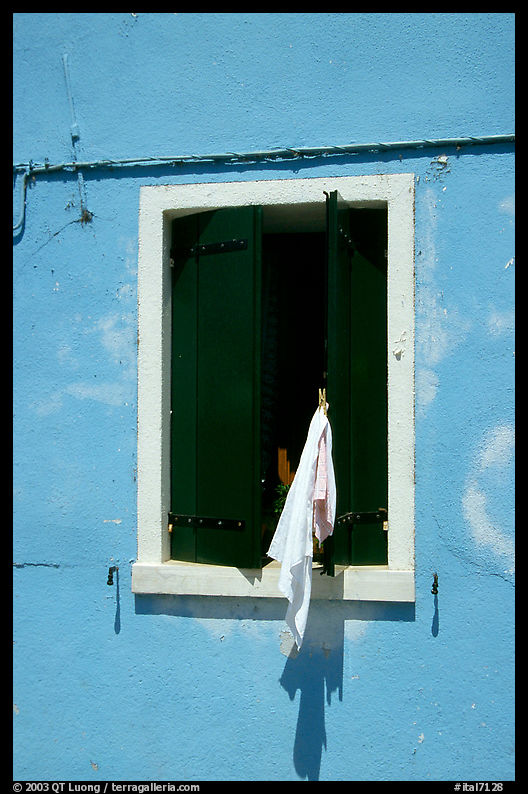 Laundry hanging from a window, Burano. Venice, Italy
