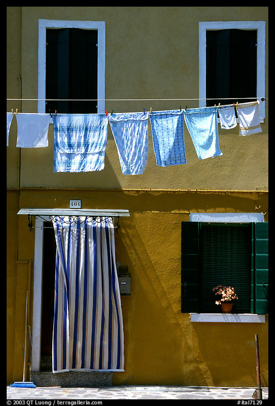 Hanging laundry and colored wall, Burano. Venice, Italy