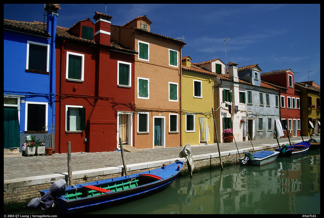 Canal lined with colorfully painted houses, Burano. Venice, Italy