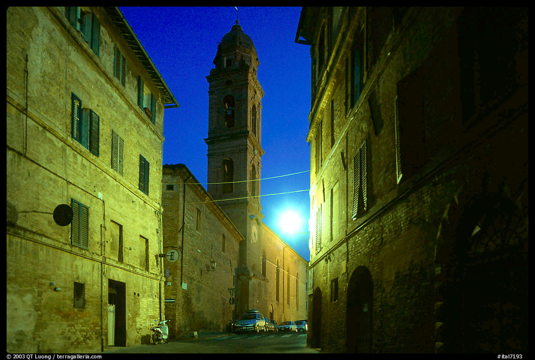 Street and church at dawn. Siena, Tuscany, Italy