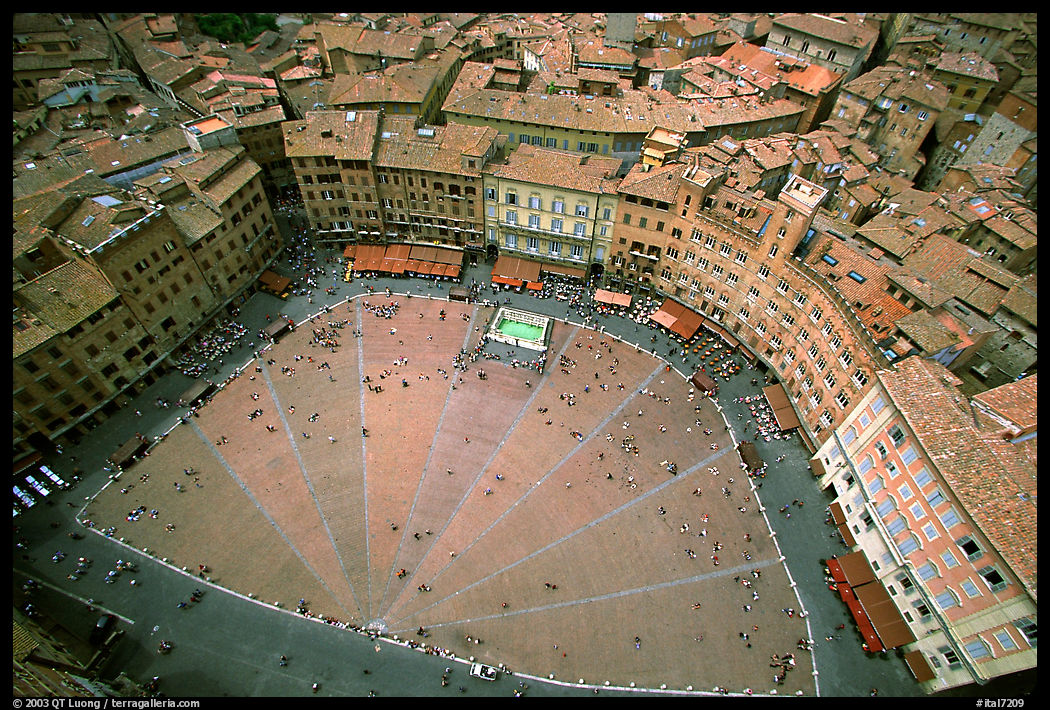 Piazza Del Campo seen from Torre del Mangia. The square's paving is divided into nine sectors, representing the members of the Coucil of Nine.. Siena, Tuscany, Italy