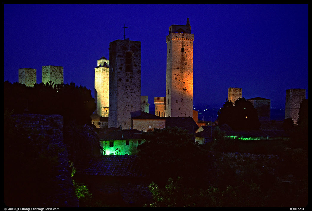 Medieval towers seen from the Rocca at night. San Gimignano, Tuscany, Italy