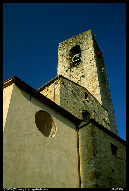 Massive shapes of the Duomo. San Gimignano, Tuscany, Italy