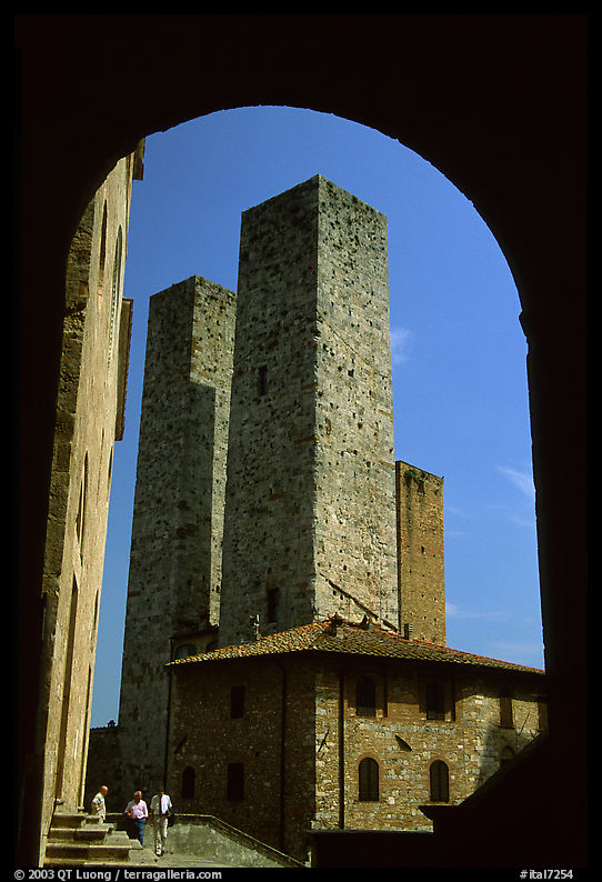 Medieval Towers framed by an arch. San Gimignano, Tuscany, Italy