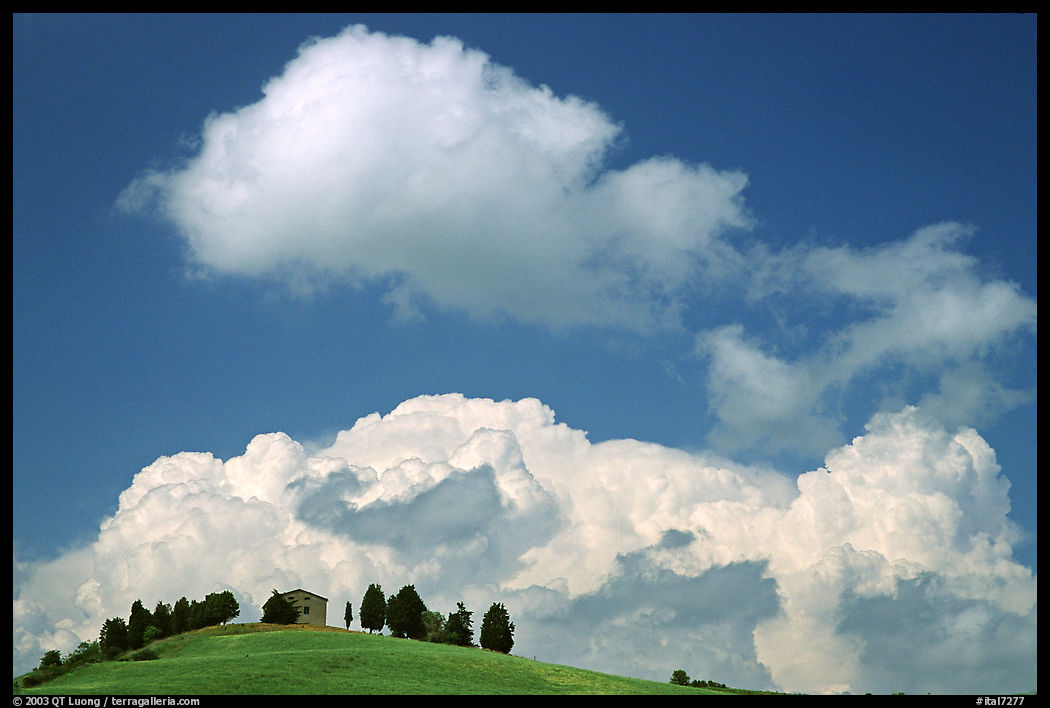 clouds above distant ridge. Tuscany, Italy