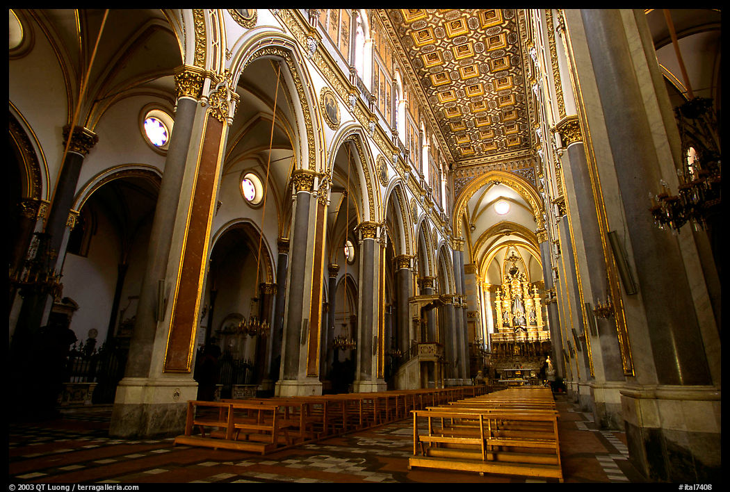 Church interior looking down the nave to the apse. Naples, Campania, Italy