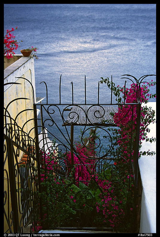 Forged metal entrance to a garden overlooking the sea, Positano. Amalfi Coast, Campania, Italy