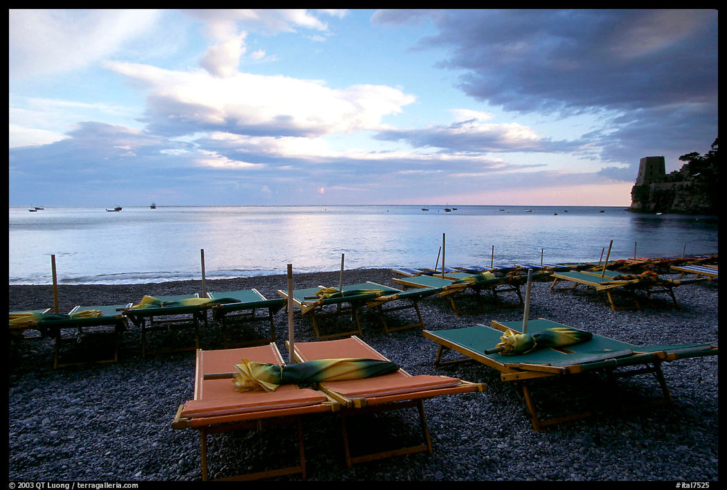 Beach chairs at sunset, Positano. Amalfi Coast, Campania, Italy