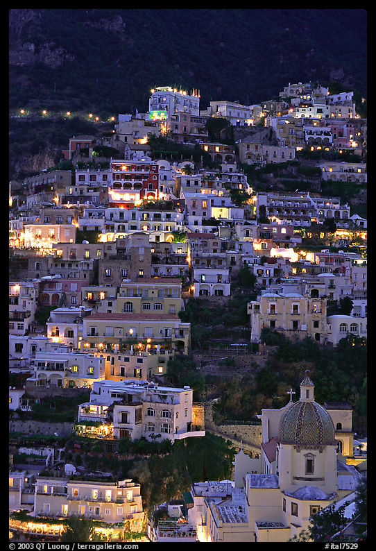 Houses on steep hill at sunset, Positano. Amalfi Coast, Campania, Italy