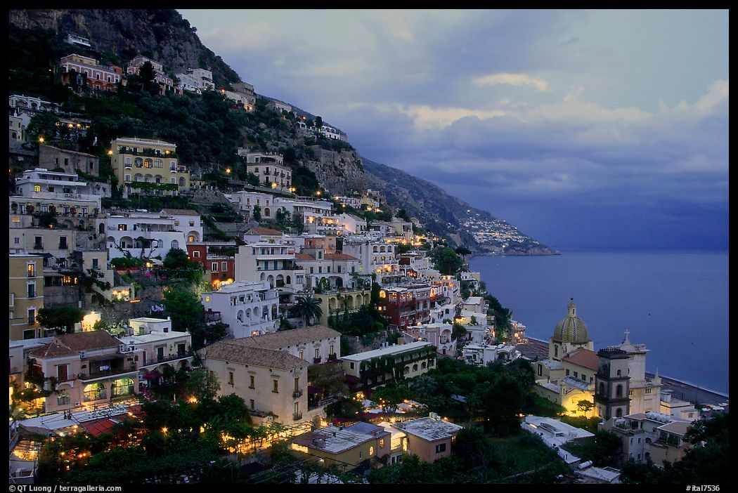 Positano lights coming up at dusk. Amalfi Coast, Campania, Italy